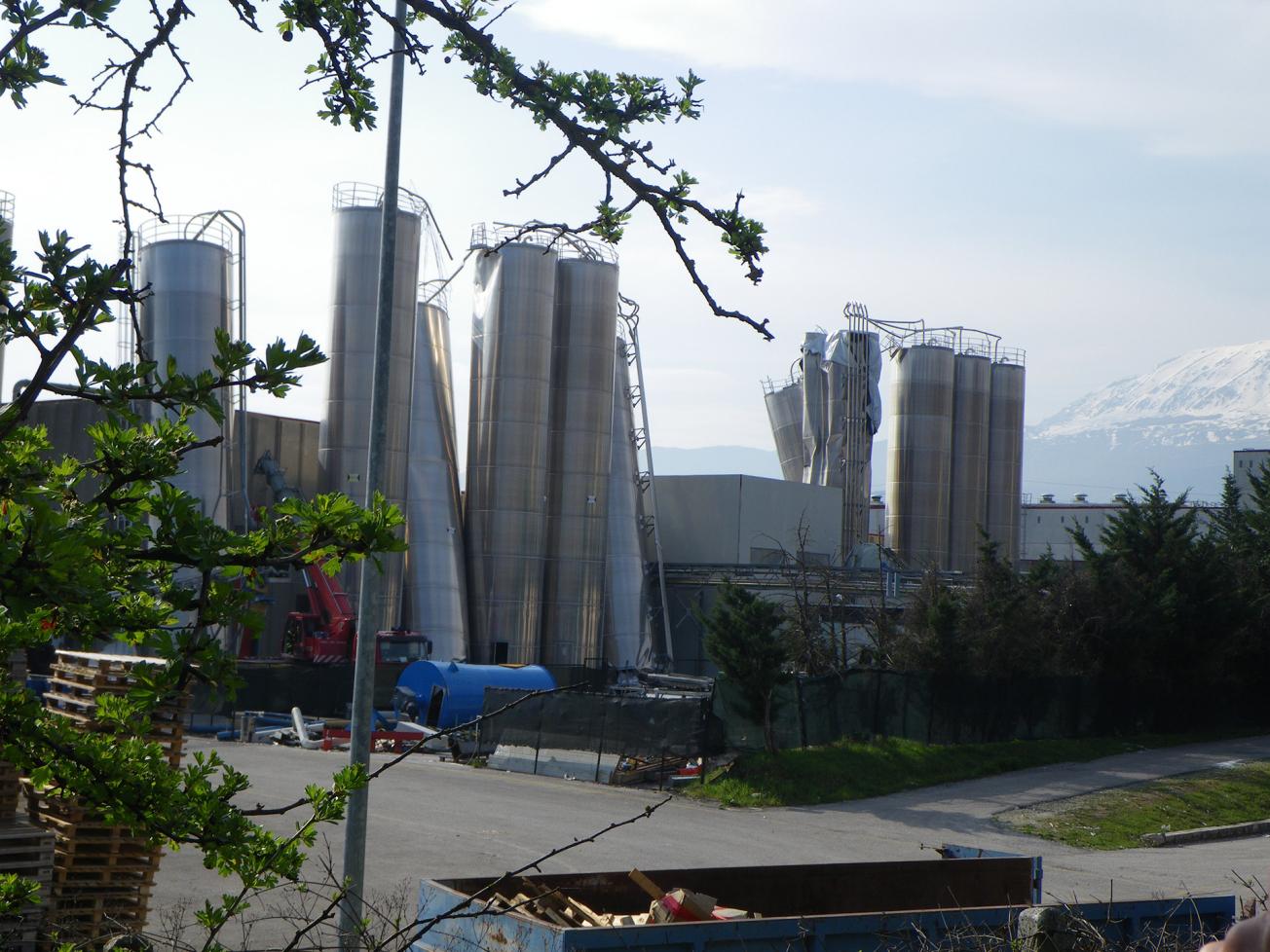 View of the buckling damage to silos in Bazzano