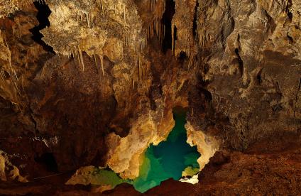 A limestone cave with its stalactites and underground lake, Hungary