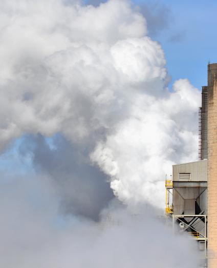 Oil refinery chimneys emitting smoke, United States
