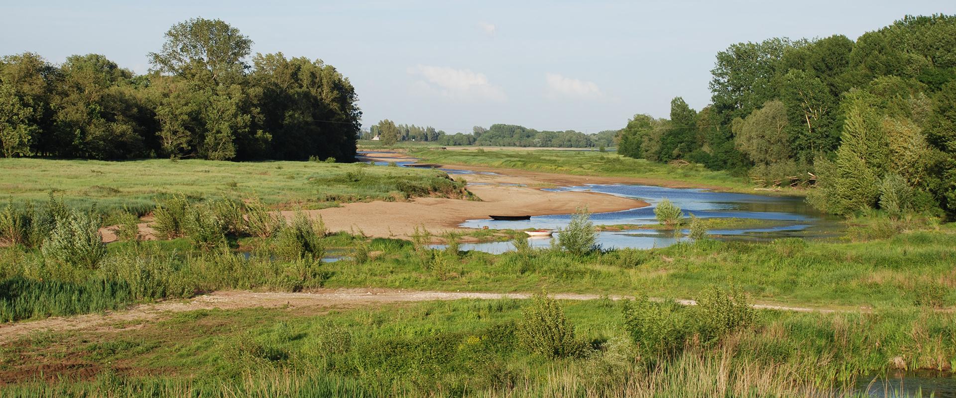 A tributary of the Loire at low water, Maine-et-Loire