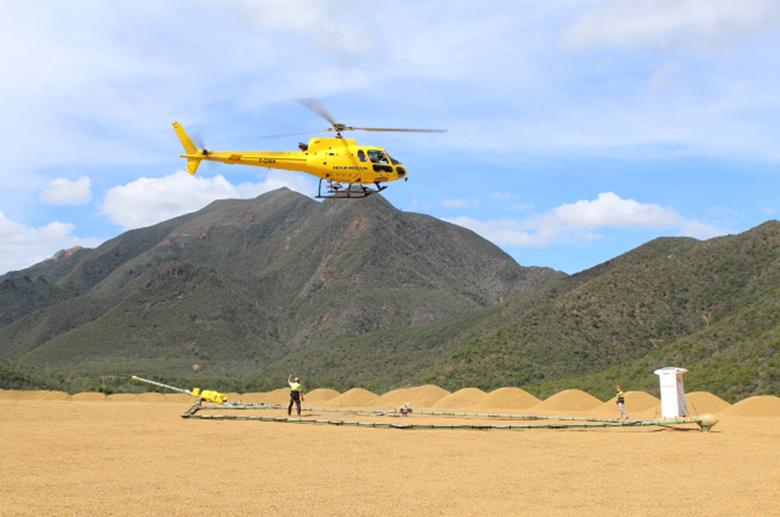 A helicopter takes off during the New Caledonia geophysical survey 