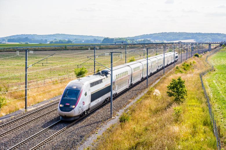 A TGV Duplex high-speed train from french company SNCF driving on the LGV Est